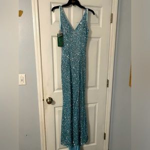 Brand new Blue sequins prom gown bought in Soho never worn due to Covid.